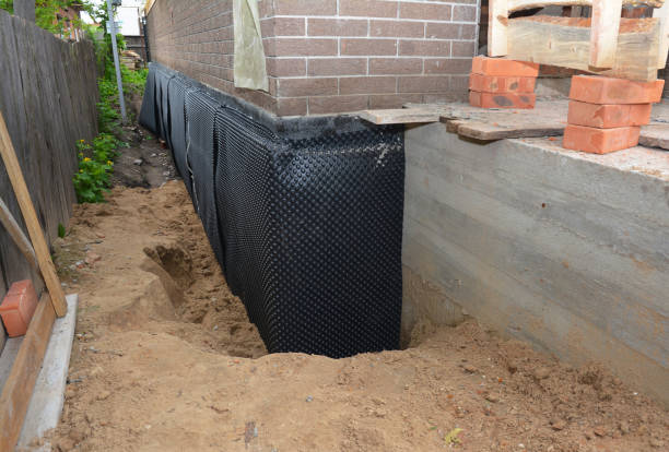 Happy homeowners after waterproofing job in Bremen